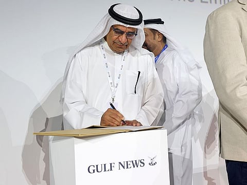 Abdul Hamid Ahmed, CEO and Editor-in-Chief of Gulf News, signing the Pledge at the Arab Media Forum in Dubai on Tuesday