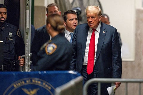 Former US President Donald Trump enters the Manhattan Criminal Court in New York on May 28, 2024.