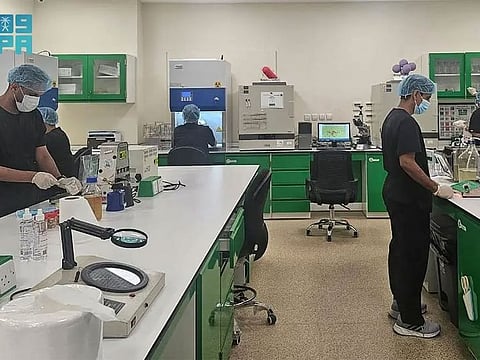 Food being tested at a lab in Mecca.
