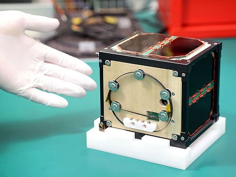 The developers plan to hand the satellite, made from magnolia wood and named LignoSat, to space agency JAXA next week.