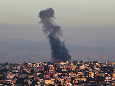 Smoke billows from the site of an Israeli airstrike that targeted the southern Lebanese village of Khiam near the border with Israel on May 29, 2024.