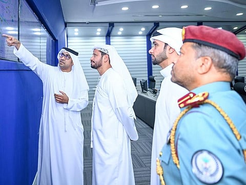 Sharjah Police Chief Maj Gen Al Shamsi (2nd L) during the launch of the new number