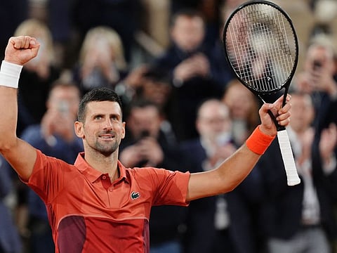 Serbia's Novak Djokovic celebrates after winning against Spain's Roberto Carballes Baena at the end of their men's singles match on Court Philippe-Chatrier at the Roland Garros Complex in Paris on Thursday.