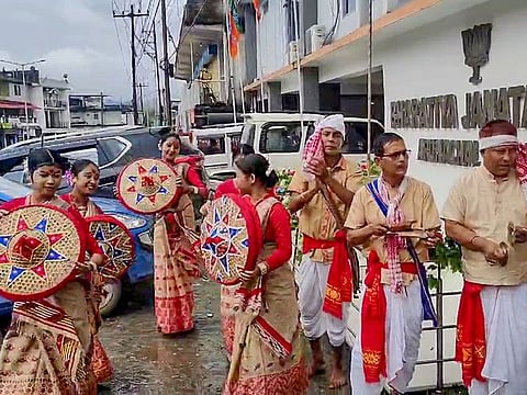 Artists dressed in traditional Assamese attire perform 'Bihu dance' as they celebrate Bharatiya Janata Party (BJP) victory in Arunachal Pradesh Assembly elections, at the party office in Itanagar on Sunday.