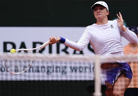 Poland's Iga Swiatek plays a forehand return to Russia's Anastasia Potapova during their women's singles round of 16 match on Court Philippe-Chatrier on Sunday.