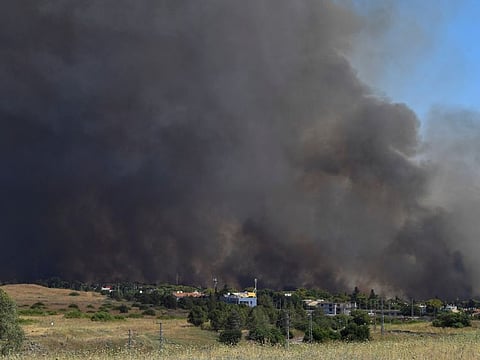 Smoke billows following rocket attacks from Lebanon in Katzrin in the Israeli-occupied Golan Heights, on June 2, 2024.