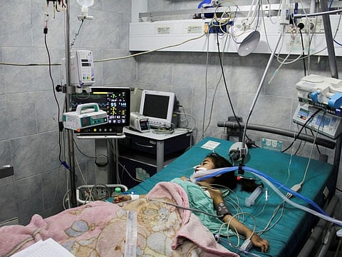 A Palestinian child, who is suffering from malnutrition, receives healthcare at Kamal Adwan Hospital in northern Gaza Strip.
