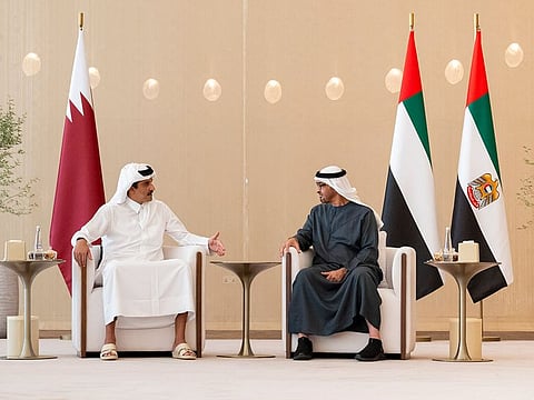 President His Highness Sheikh Mohamed bin Zayed Al Nahyan and Sheikh Tamim bin Hamad Al Thani, Emir of the State of Qatar, during their meeting in Abu Dhabi on Sunday