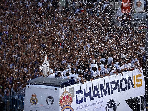 Real Madrid bus arriving to the celebration with fans at Cibeles Fountain, Madrid, Spain on Sunday.