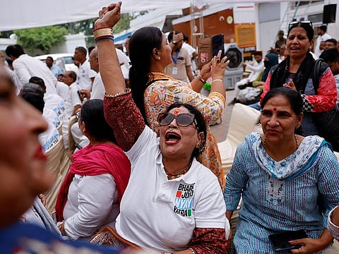 An Indian National Congress (INC) supporter reacts to general election results in New Delhi, India, June 4, 2024.