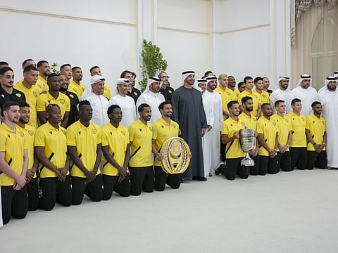 UAE President Sheikh Mohammed Bin Zayed Al Nahyan with the Al Wasl Football Club players, staff and officials.