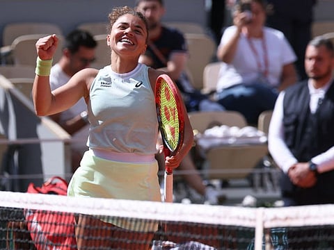 Italy's Jasmine Paolini celebrates after winning against Kazakhstan's Elena Rybakina at the end of their women's singles quarter-final match on Court Philippe-Chatrier at the Roland Garros Complex in Paris on Wednesday.