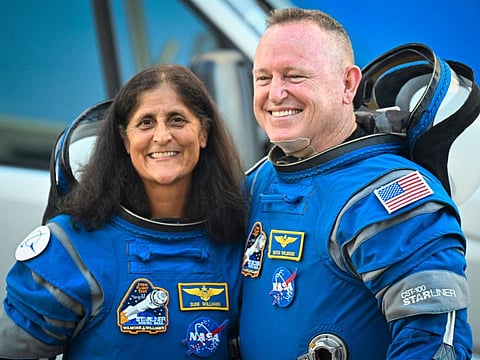 Nasa astronauts  Butch Wilmore (right) and Suni Williams depart the Neil A. Armstrong Operations and Checkout Building at Kennedy Space Center for Launch Complex 41 at Cape Canaveral Space Force Station in Florida to board the Boeing CST-100 Starliner spacecraft for the Crew Flight Test launch, on June 5, 2024.
