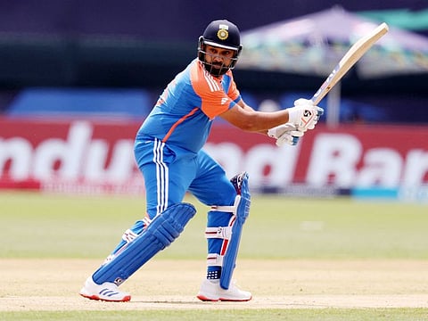 Rohit Sharma of India plays a shot during the ICC Men's T20 Cricket World Cup match against Ireland in New York on June 05, 2024. The Indian captain was hit on the upper arm by a delivery from Josh Little, and had to retire hurt.