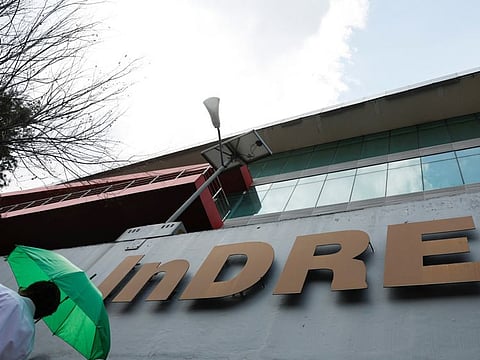 A man walks past the Institute of Epidemiological Diagnosis and Reference after the World Health Organization said a person's death was caused by the first laboratory-confirmed human case of infection with the A(H5N2) subtype of bird flu reported globally, and the first human infection with the H5 strain of the virus reported in Mexico.