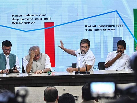 India's Congress party leader Rahul Gandhi (centre) addresses a press conference at the party headquarters in New Delhi on June 6, 2024.