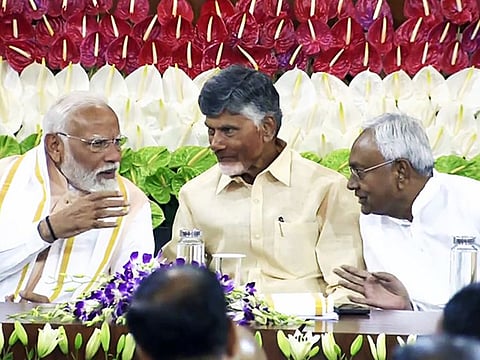 Prime Minister Narendra Modi in conversation with Telugu Desam Party (TDP) Chief N Chandrababu Naidu and Bihar Chief Minister Nitish Kumar during the National Democratic Alliance (NDA) Parliamentary Party meeting, at the Samvidhan Sadan, in New Delhi on Friday, June 7, 2024.