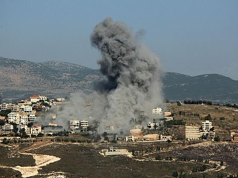 Smoke billows from the site of an Israeli airstrike on the southern Lebanese village of Khiam near the border on June 8, 2024.