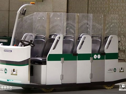 Electric vehicles for transporting pilgrims during the Tawaf and Sa'i rituals.