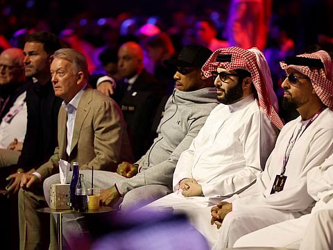 Turki bin Abdul Mohsen Al Sheikh (2nd from right) and Anthony Joshua to his right, during a fight at Kingdom Arena.