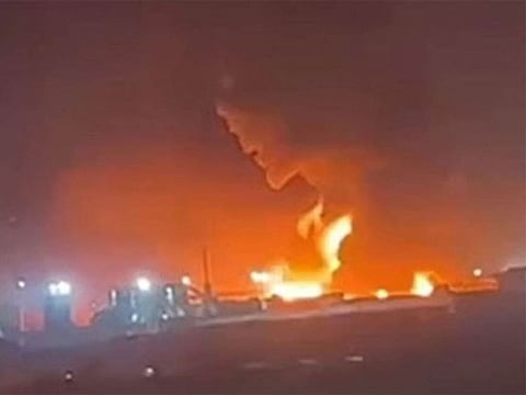 Thick smoke rose hundreds of metres into the air.