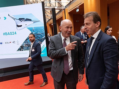 Dave Calhoun, CEO of Boeing Co, left, and Guillaume Faury, CEO of Airbus SE, right, at the Berlin Aviation Summit in Berlin, Germany, on Tuesday, June 4, 2024. Widebody jets have seen a surge in demand as long-haul travel rebounds from the lows of the pandemic.