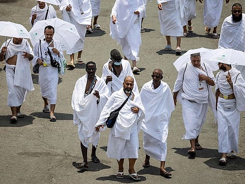 Worshippers walk around the Kaaba, Islam's holiest shrine, at the Grand Mosque in Mecca.