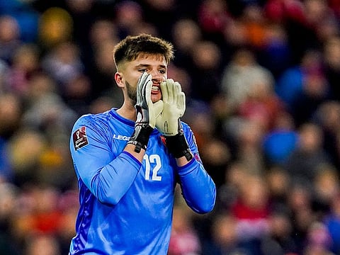 Montenegro's goalkeeper Matija Sarkic reacts during the FIFA World Cup Quatar 2022 qualification Group G football match between Norway and Montenegro in Oslo on October 11, 2021.
