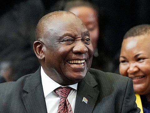 South African president Cyril Ramaphosa reacts after being re-elected as president of South Africa during the first sitting of the National Assembly following elections at the Cape Town International Convention Center (CTICC) in Cape Town, on June 14, 2024.