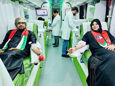Salam Kanyappadi and his wife, Riyana Salam, donate blood during a UAE National Day celebration in Dubai.