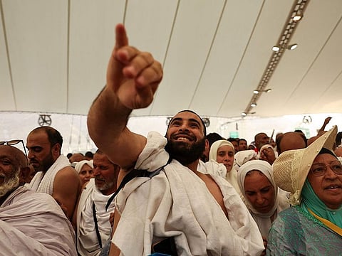 Muslim pilgrims perform the symbolic 'stoning of the devil' ritual as part of the hajj pilgrimage in Mina, near Saudi Arabia's holy city of Mecca.