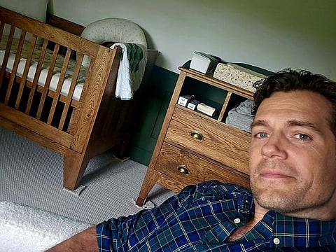 Cavill also reassured his fans and followers that they wouldn't be keeping the pillows in the baby's crib.