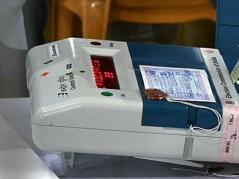 Votes being counted from an Electronic Voting Machine (EVM) at a counting station in Mumbai recently.