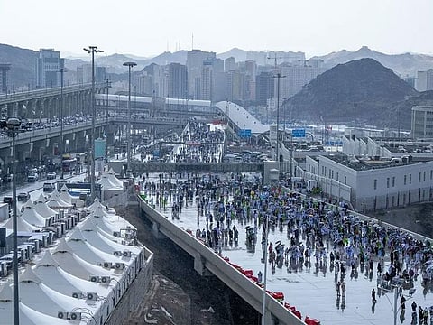 The unexpected showers were met with joy and gratitude by the pilgrims.
