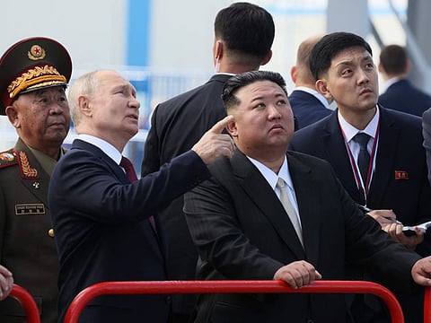 Russia's President Vladimir Putin (centre left) and North Korea's leader Kim Jong Un (centre right) visit the Vostochny Cosmodrome in Amur region on September 13, 2023.