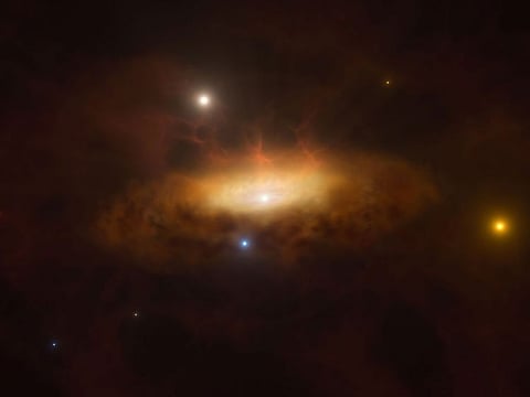 This handout artist’s impression obtained on June 18, 2024 from the European Southern Observatory (ESO) shows the growing disc of material being pulled in by the black hole as it feeds on the gas available in surroundings of the galaxy SDSS1335+0728, making the galaxy light up. In late 2019, the galaxy SDSS1335+0728 suddenly started shining brighter than ever before and was classified as having an active galactic nucleus, powered by a massive black hole in the galaxy’s core.