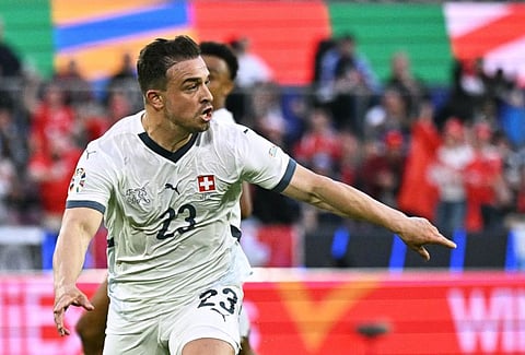 Switzerland's midfielder Xherdan Shaqiri celebrates after scoring his team's goal during the Uefa Euro 2024 Group A match against Scotland.