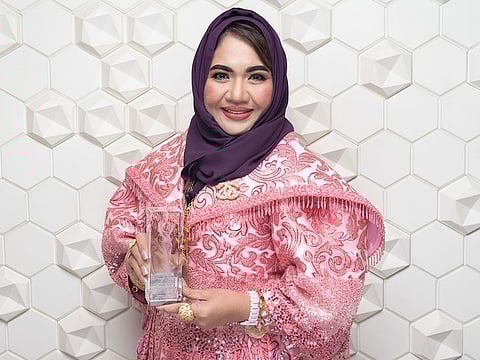 Dr Mary Jane Alvero-Al Mahdi with her Excellence in Business – Best in Quality Management award