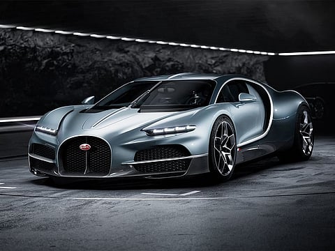 The car, with its carbon body and 3D-printed parts, has three electric motors and one newly designed 1,000-horsepower fuel engine.