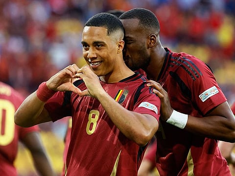 Belgium's Youri Tielemans celebrates scoring their first goal.