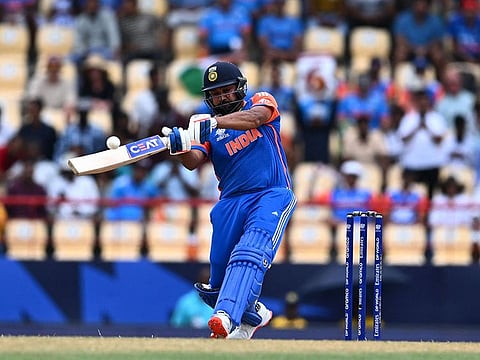 India's Rohit Sharma hits a shot during the ICC men's Twenty20 World Cup 2024 Super Eight cricket match between Australia and India.