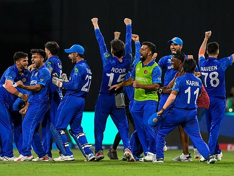 Afghanistan's players celebrate after winning their Super Eight match against Bangladesh, which secured them a place in the semi-finals of the Twenty20 World Cup.