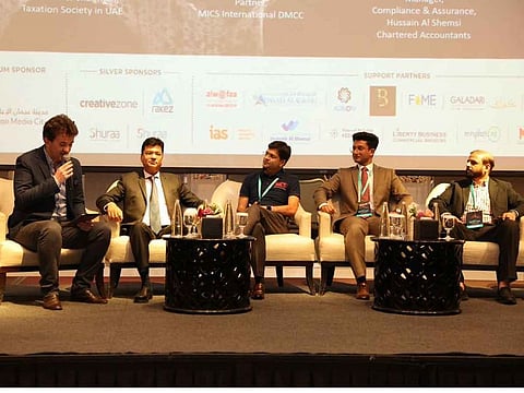 Naveen Sharma, Founder & Chairman, Taxation Society in UAE (second from left), Sheetal Soni, Partner, MICS International DMCC, Jaison Mandapathil, Manager, Compliance & Assurance, Hussain Al Shemsi Chartered Accountants, and Muneer Al Wafaa, Founder and CEO, Al Wafaa Group, during a panel discussion at Invest UAE seminar