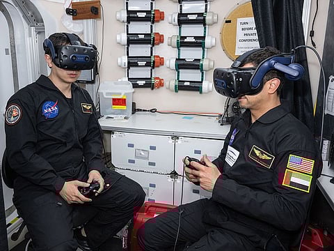 Dr Shareef Al Romaithi (R) performing the Virtual Reality walk from within the Human Exploration Research Analog (HERA) habitat at NASA’s Johnson Space Centre in Houston, USA