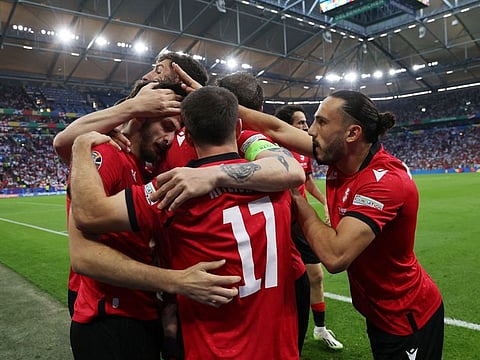 Georgia celebrate their victory over Portugal