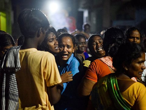 Family members mourn the death of people who died after consuming toxic liquor at Kallakurichi, in Tamil Nadu, India, June 20, 2024