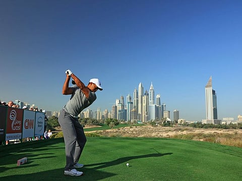 Tiger Woods in action at Emirates Golf Club