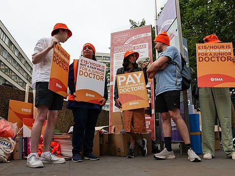 Junior doctors strike on a picket line outside St. Thomas' Hospital in London on June 27, 2024.