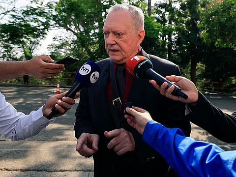 Lawyer and one of the main defendants in the Panama Paper case, Jurguen Mossack, speaks to reporters upon his arrival at the court of justice in Panama City on April 8, 2024.