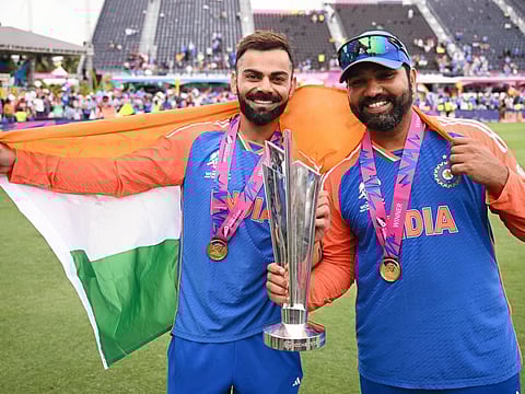 India's captain Rohit Sharma and Virat Kohli with the trophy after Team India won the T20 World Cup 2024 final against South Africa in Barbados on Saturday.